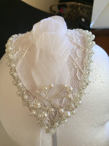 Bridal pearl , lace and white feather headband.
