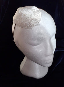 Pearl and flower bridal headpiece.