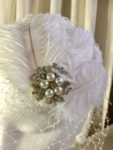 Load image into Gallery viewer, White feather and diamante headpiece with birdcage .