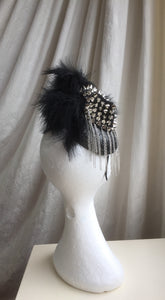 Stud and feather rock chick headpiece.