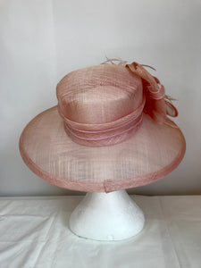 10- Pale pink fabulous feather hat.