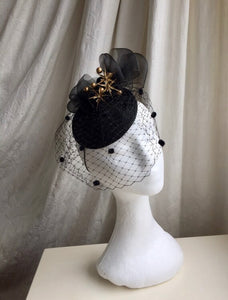 Black and gold vintage inspired headpiece.